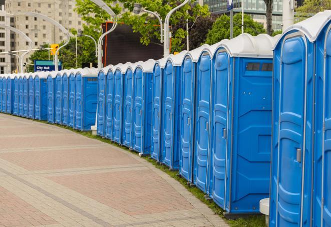 a row of portable restrooms at a fairground, offering visitors a clean and hassle-free experience in trade
